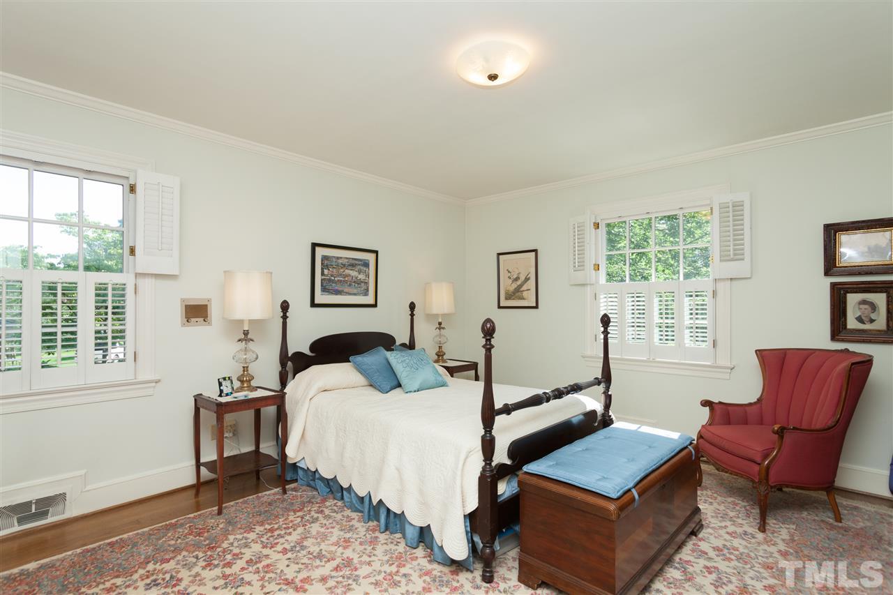 2401 Ridge Road Raleigh, NC 27612 - Photo 15 of 24 a bedroom with furniture and a window