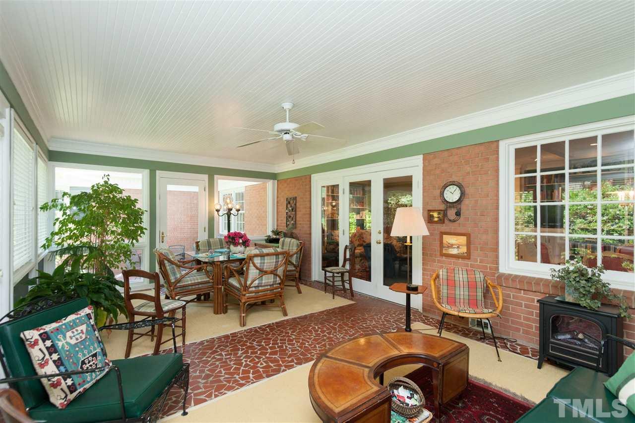 2401 Ridge Road Raleigh, NC 27612 - Photo 19 of 24 a living room with furniture and a potted plant
