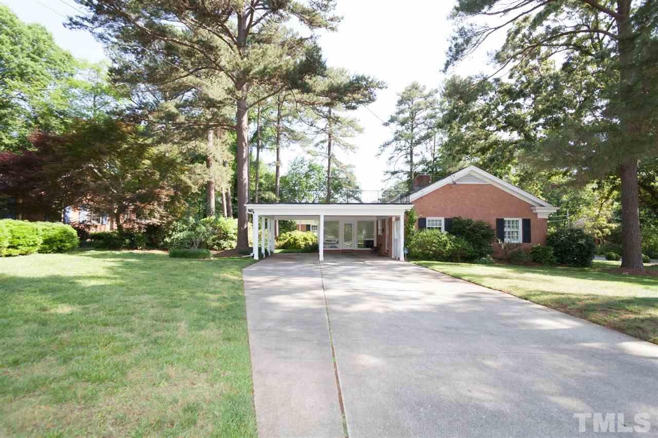 2401 Ridge Road Raleigh, NC 27612 - Photo 23 of 24 a front view of a house with garden