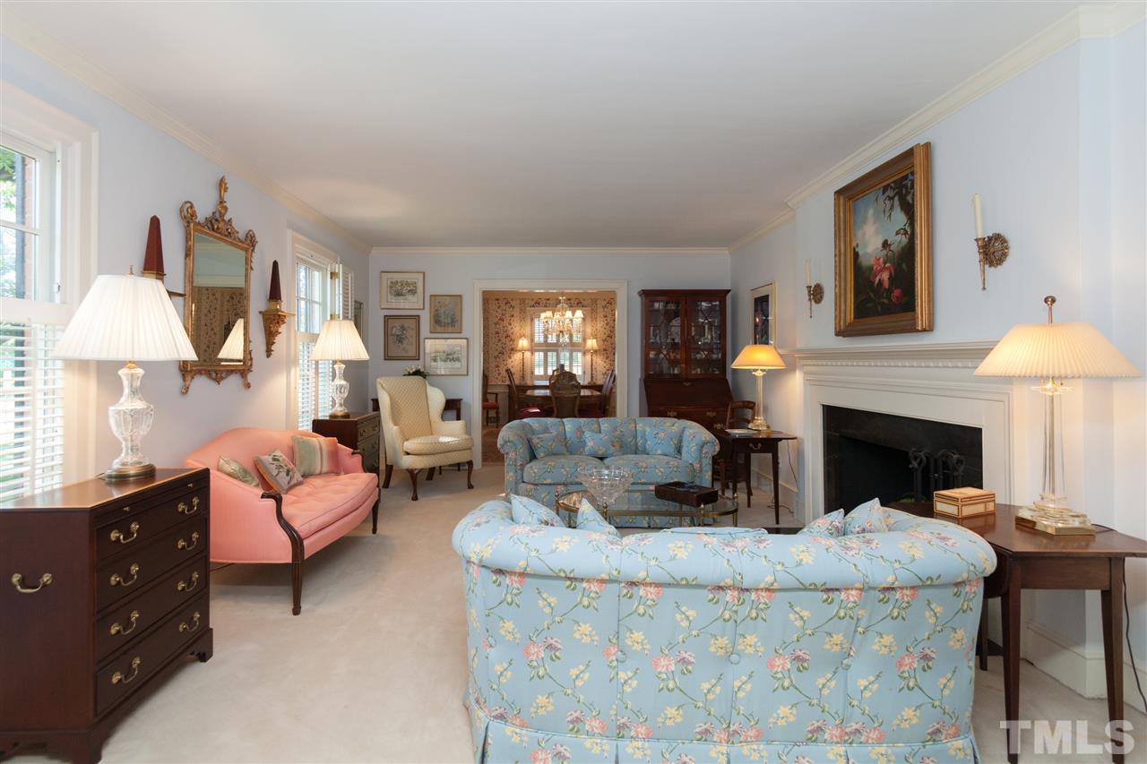 2401 Ridge Road Raleigh, NC 27612 - Photo 4 of 24 a living room with furniture and a fireplace