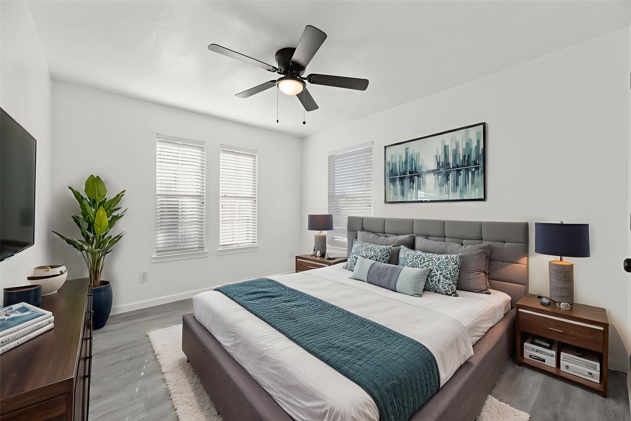 19910 Rustic Lake Lane Cypress, TX 77433 - Photo 11 of 21 This comfortable secondary bedroom offers a bright and inviting space, featuring beautiful large windows. Secondary bedroom virtually staged so you can imagine the possibilities.