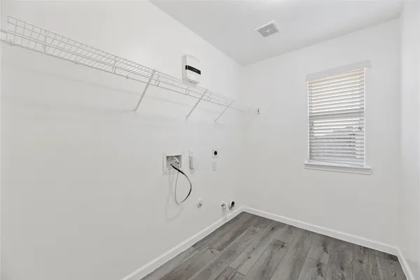 a view of a room with racks on the wall