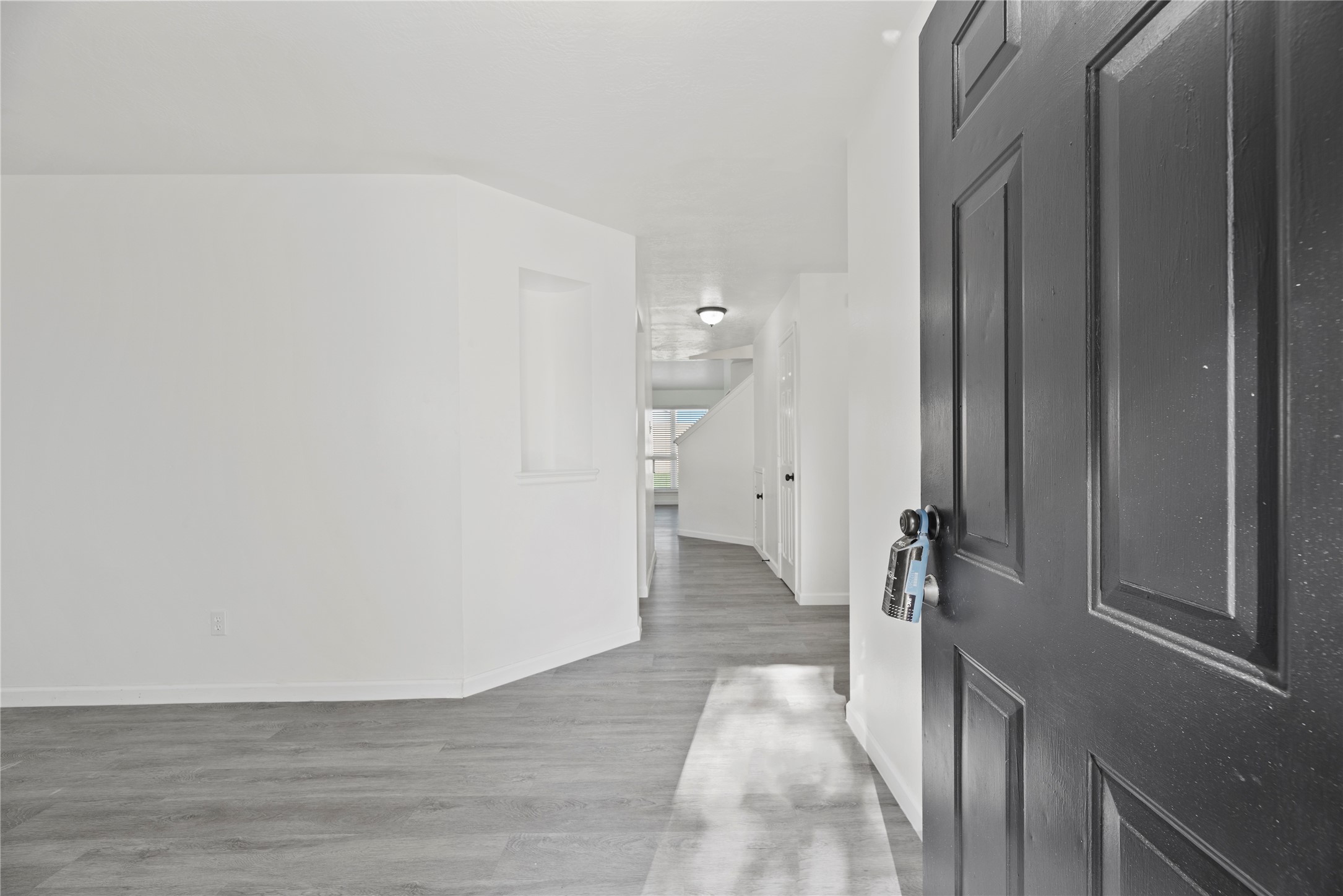 19910 Rustic Lake Lane Cypress, TX 77433 - Photo 2 of 21 Step inside... where this remodeled home with high ceilings creates an open and airy transition into the heart of the residence as you step through.