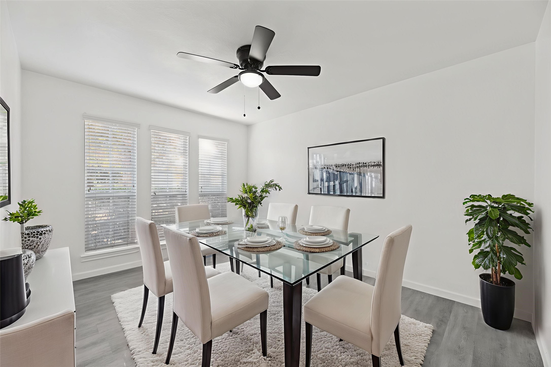 19910 Rustic Lake Lane Cypress, TX 77433 - Photo 6 of 21 The formal dining room, located just off the entry, features high ceilings and large windows that create a welcoming atmosphere for gatherings. The dining room virtually staged so you can imagine the possibilities.