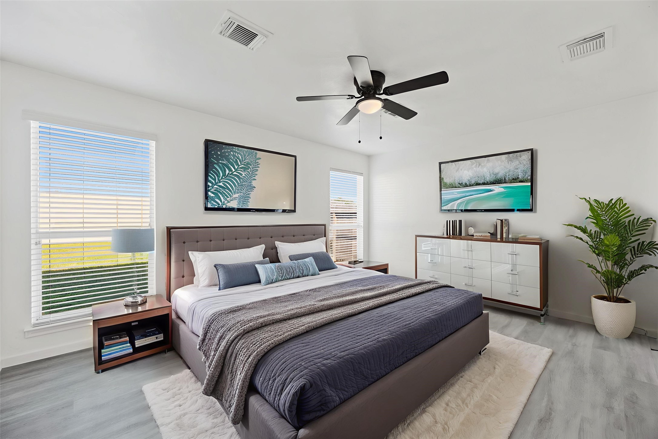 19910 Rustic Lake Lane Cypress, TX 77433 - Photo 7 of 21 The primary bedroom offers a comfortable and private retreat, featuring convenient direct access to its en-suite bath and walk-in closet, simplifying your daily routine. The primary bedroom virtually staged so you can imagine the possibilities.