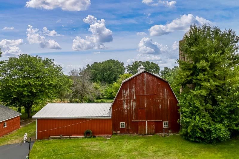 14350 Trask Bridge Road Durand, IL 61024 - Photo 54 of 90 a view of backyard with deck and garden