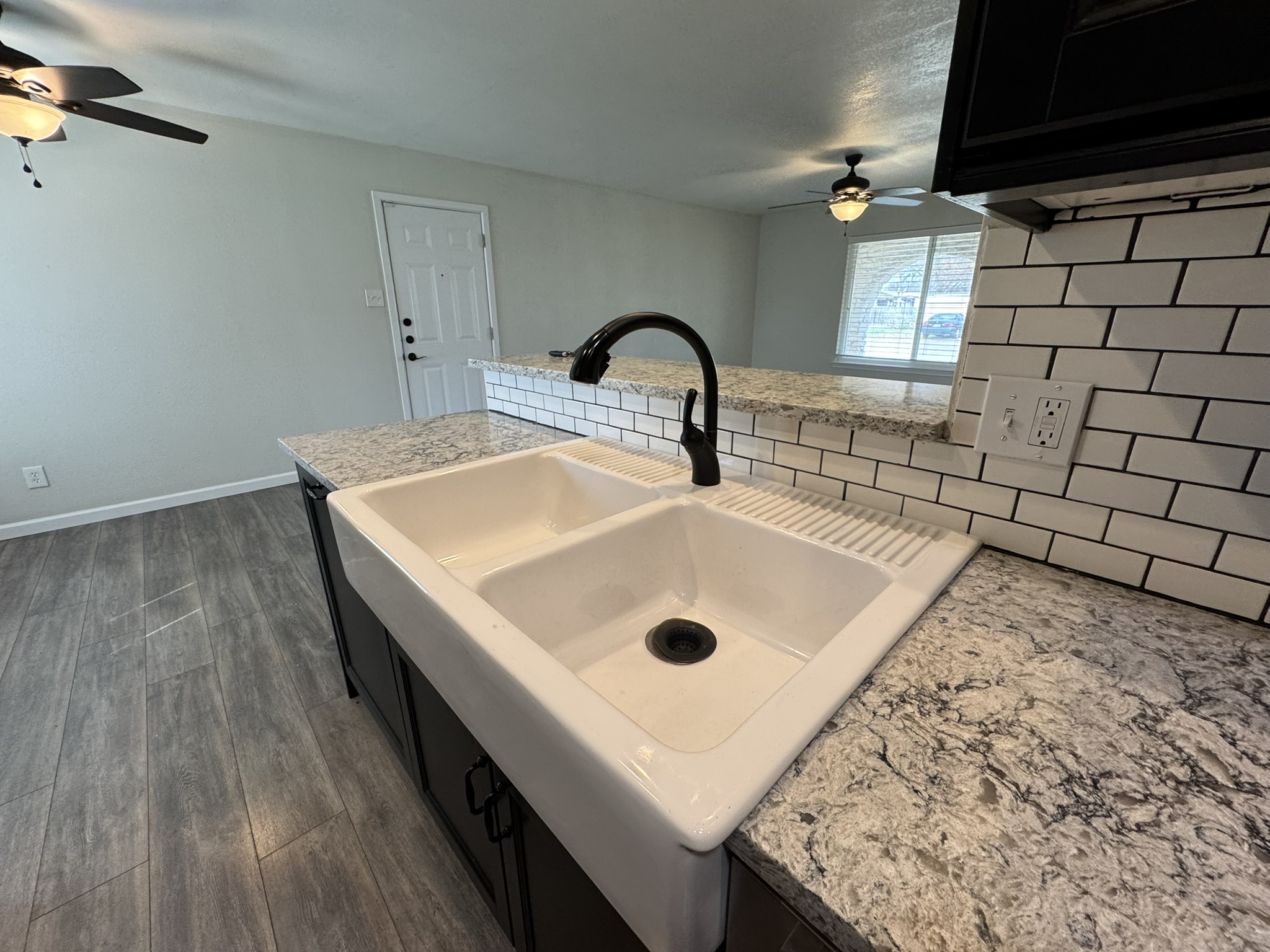 2006 Ash Street Georgetown, TX 78626 - Photo 6 of 21 updates counters, sink, and backsplash