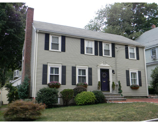 19 Burrell Street Melrose, MA 02176 - Photo 1 of 1 a front view of a house with a yard