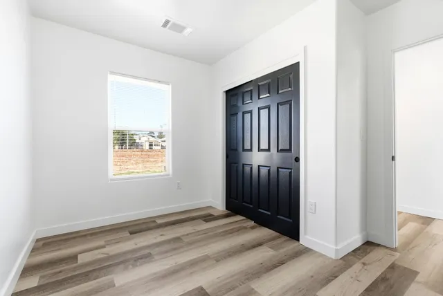 a bathroom with a window and shower