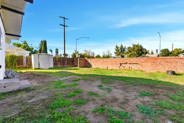 a front view of house with yard and seating area