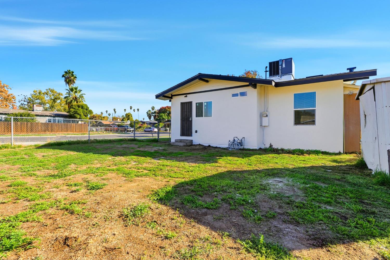 3763 East Verrue Avenue Fresno, CA 93702 - Photo 24 of 24 a front view of house with yard and seating area