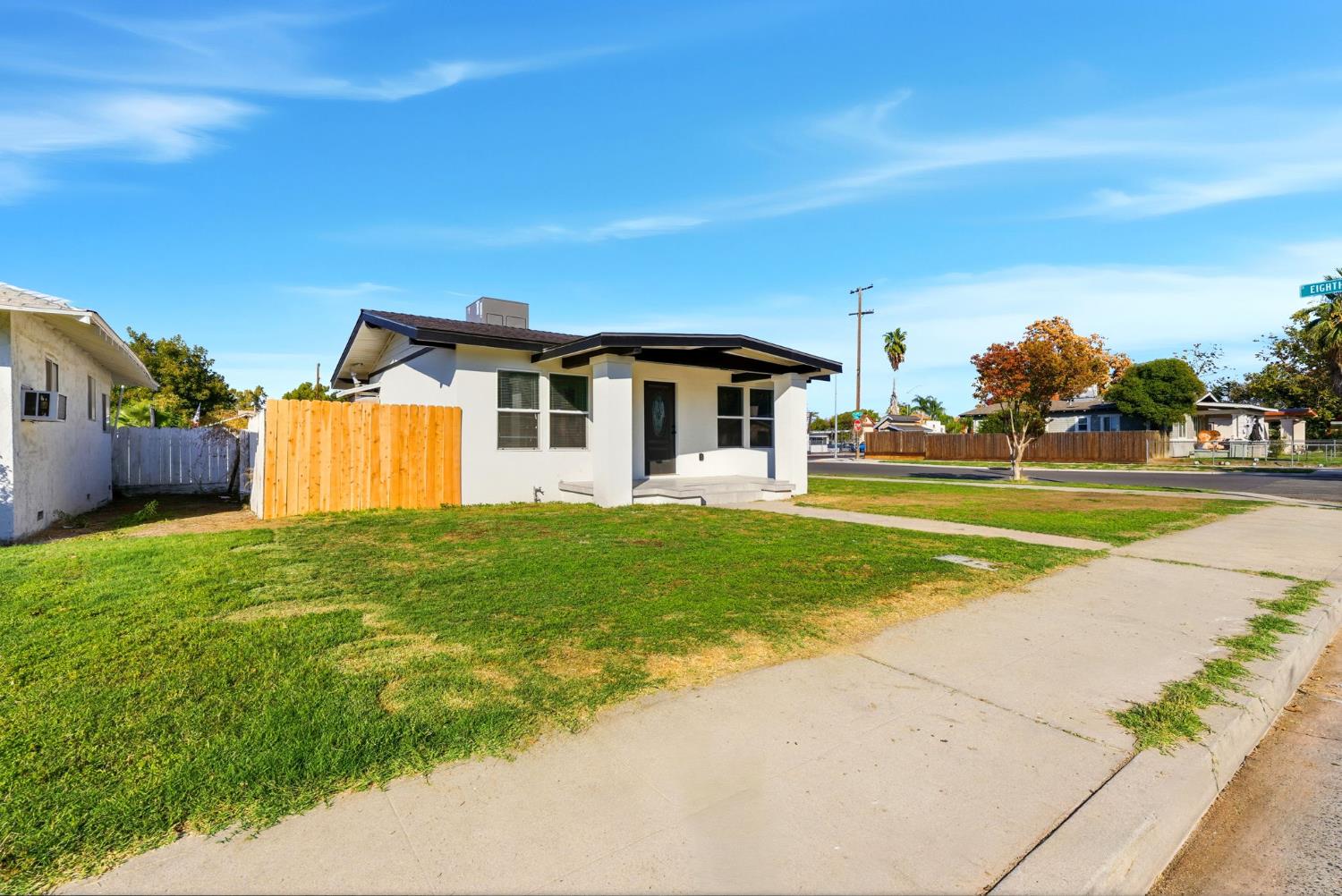 3763 East Verrue Avenue Fresno, CA 93702 - Photo 3 of 24 a front view of a house with garden