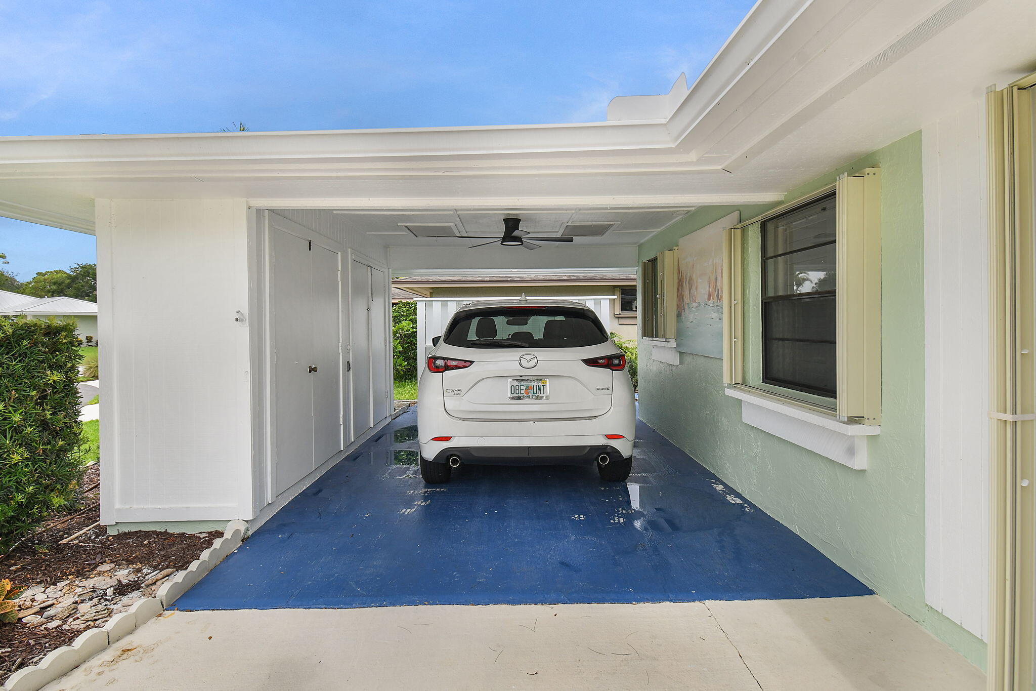 5251 Southeast Sea Island Way Stuart, FL 34997 - Photo 39 of 68 a view of living room with furniture and window