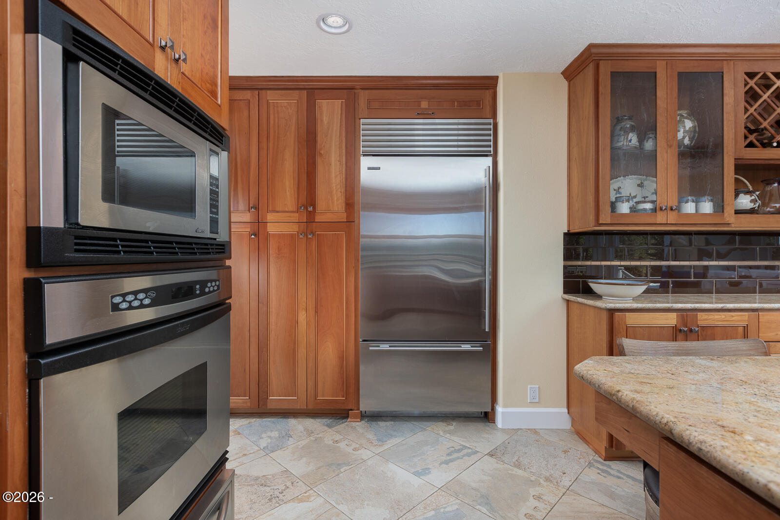 6905 Northeast Highland Road Otis, OR 97368 - Photo 23 of 76 a kitchen with a refrigerator stove and microwave