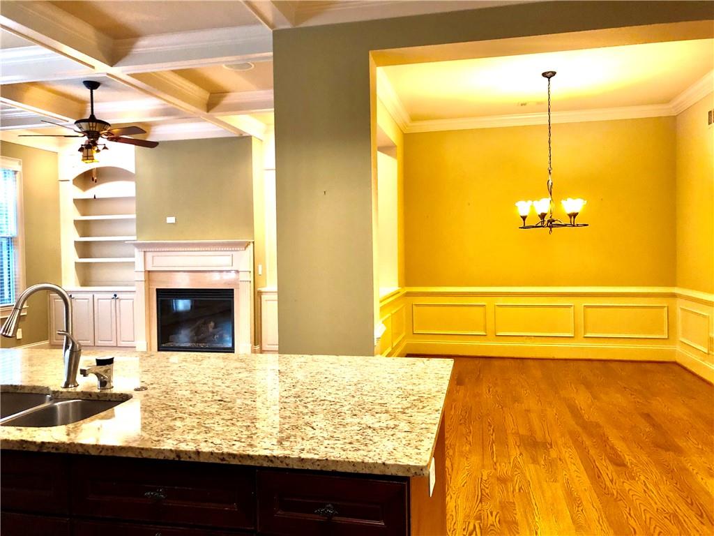 10575 Bent Tree View Duluth, GA 30097 - Photo 3 of 20 a bathroom with a granite countertop sink and a mirror