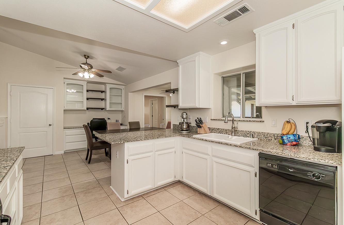 29039 Auberry Road Prather, CA 93651 - Photo 11 of 73 a kitchen with a sink cabinets and window