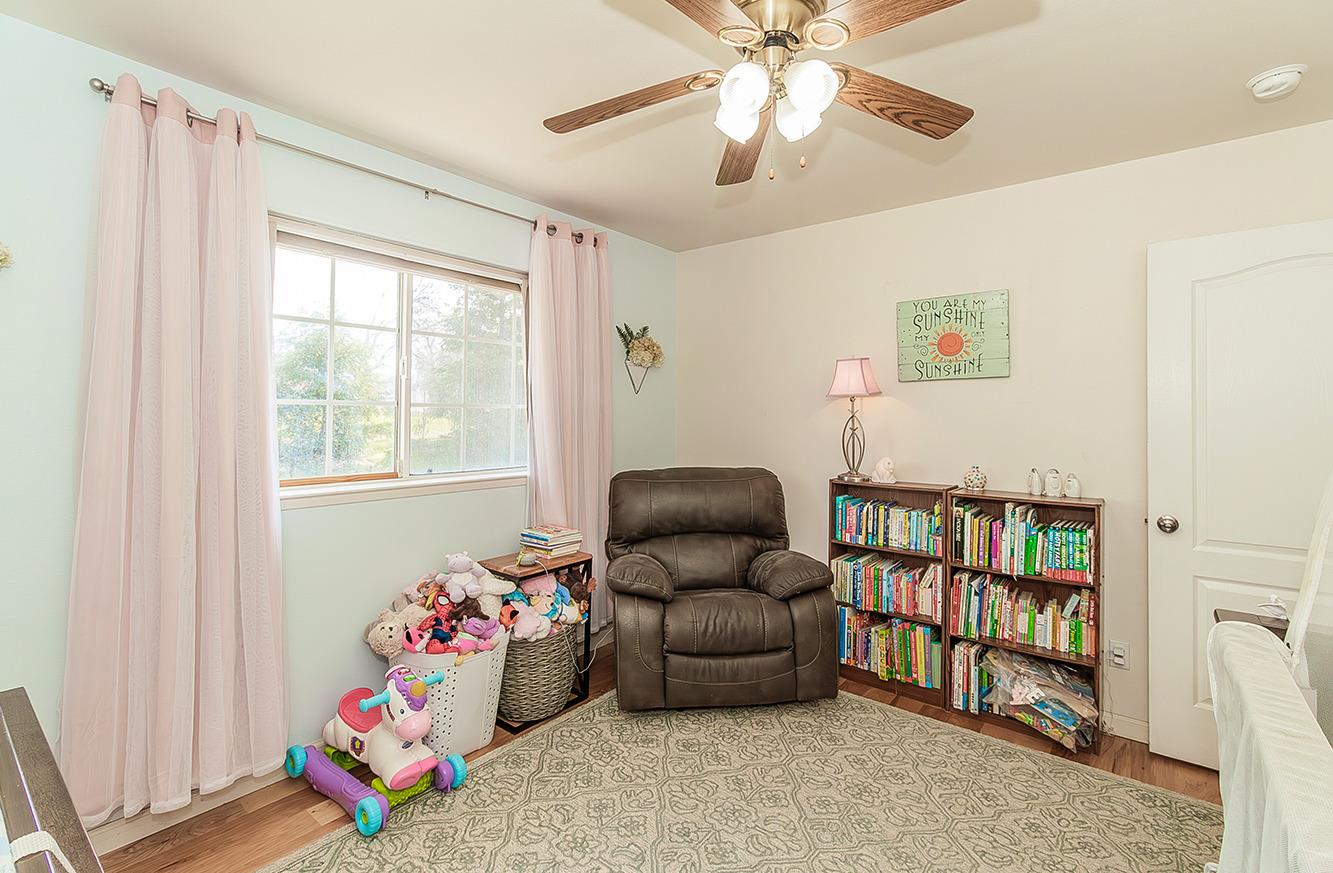 29039 Auberry Road Prather, CA 93651 - Photo 23 of 73 a living room with furniture and a window
