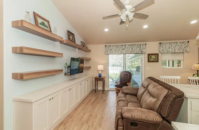 a view of a park with large trees