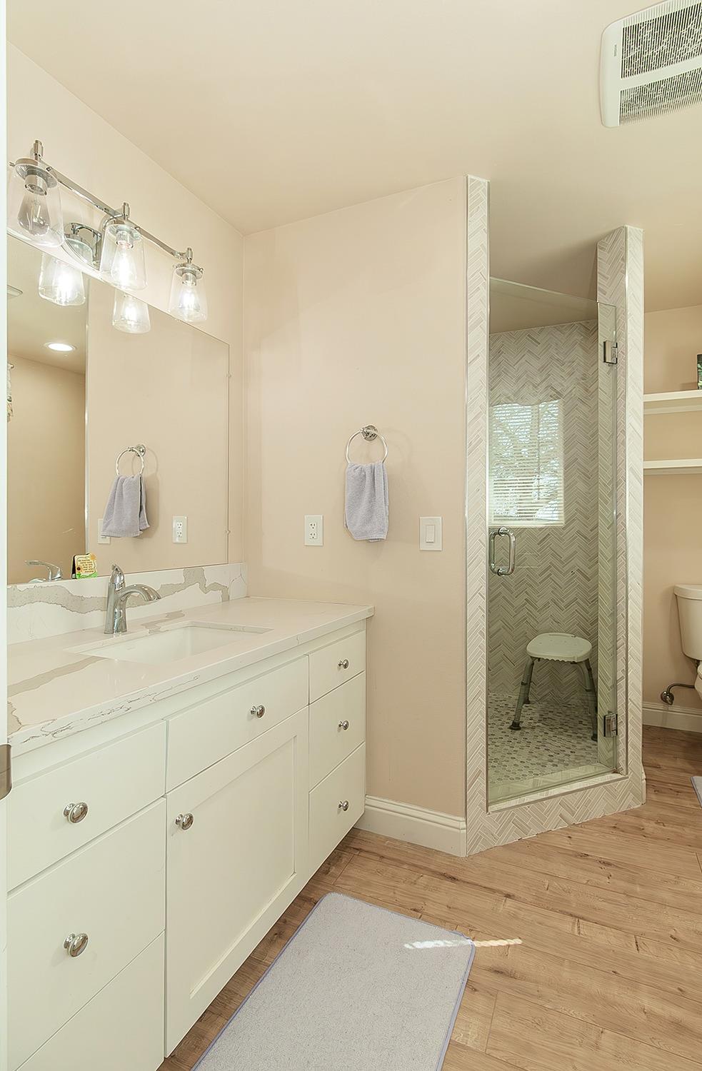 29039 Auberry Road Prather, CA 93651 - Photo 39 of 73 a bathroom with a granite countertop sink mirror and double