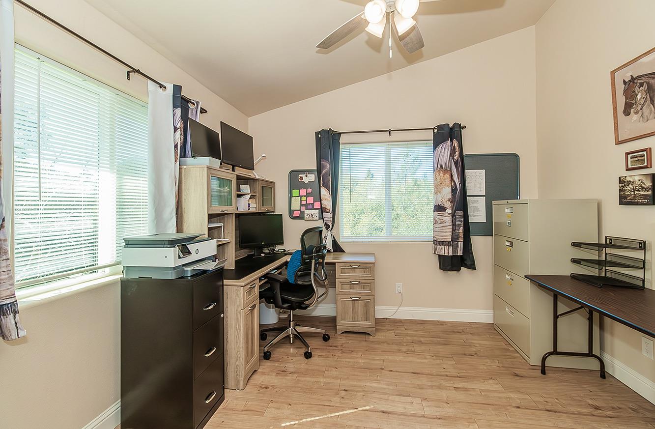 29039 Auberry Road Prather, CA 93651 - Photo 45 of 73 a view of a workspace with furniture and a window