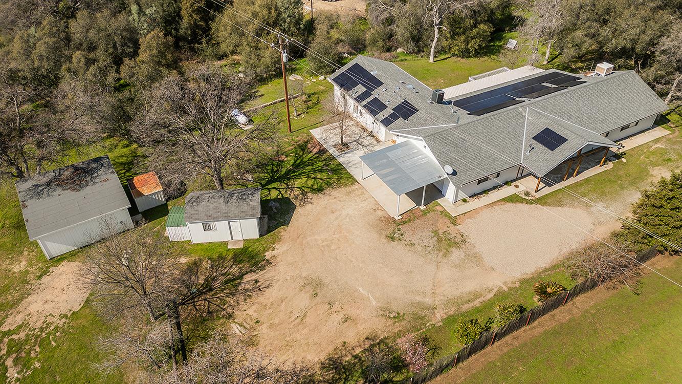 29039 Auberry Road Prather, CA 93651 - Photo 52 of 73 an aerial view of a house with a yard and lake view