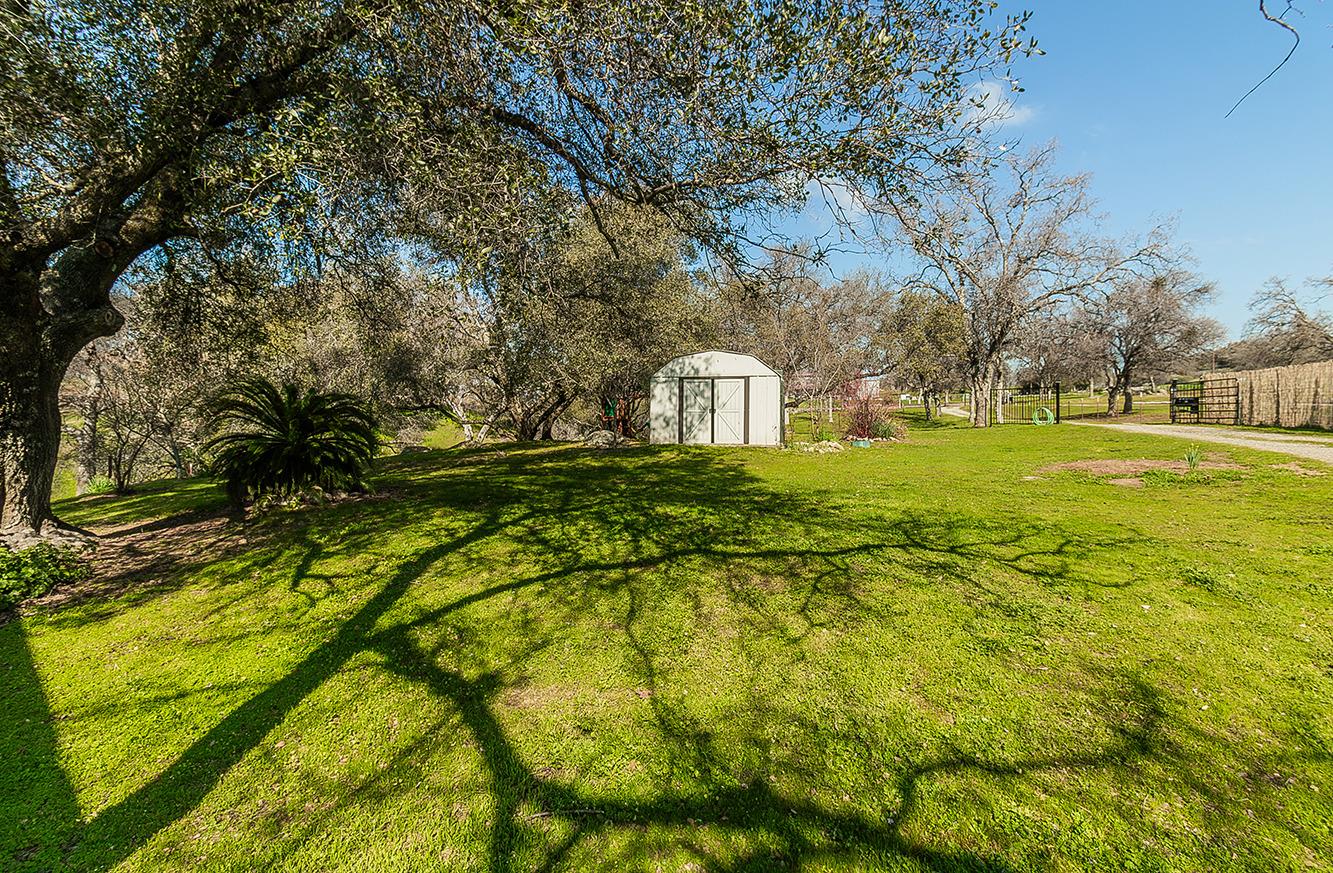 29039 Auberry Road Prather, CA 93651 - Photo 58 of 73 a view of an house with backyard and trees