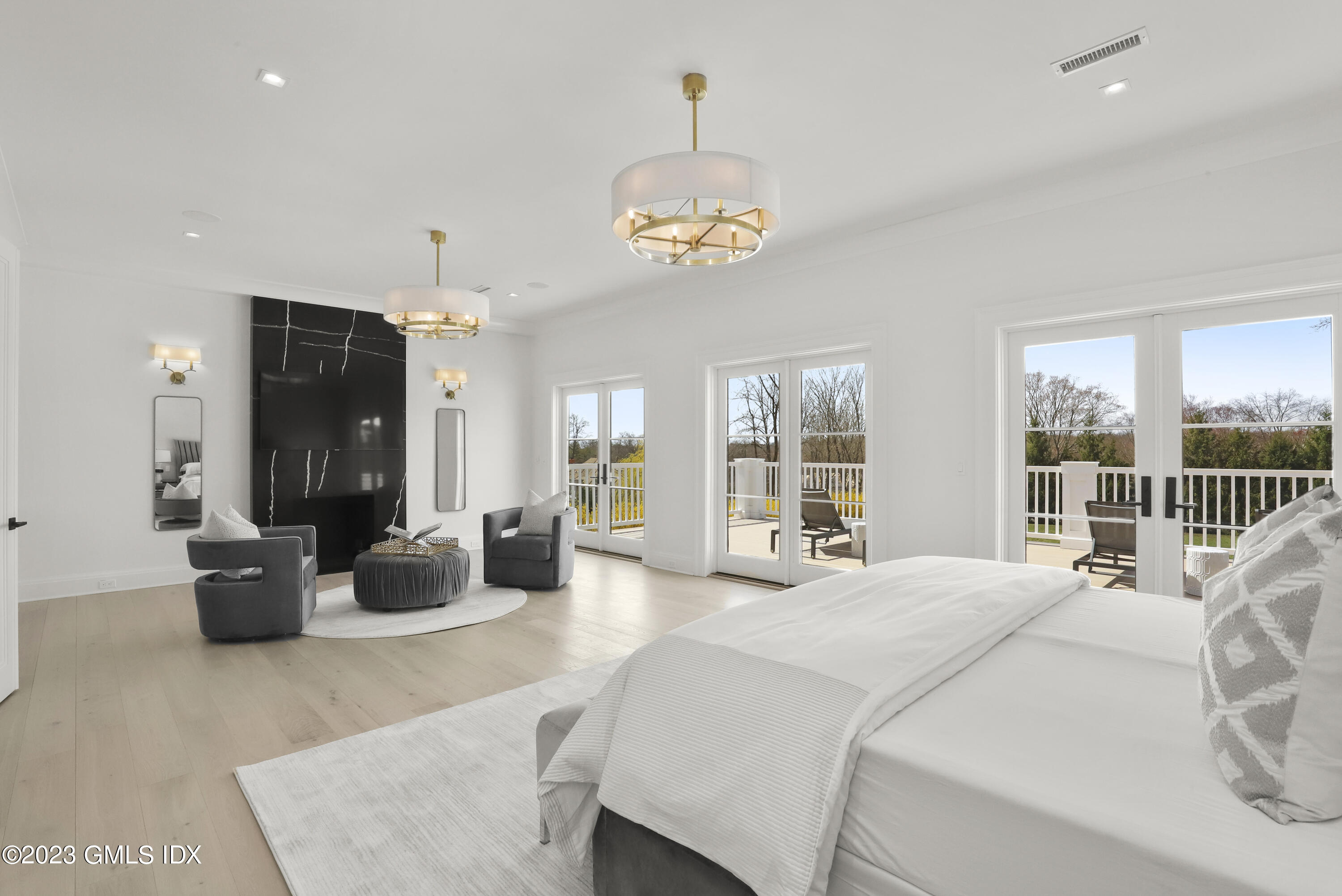 32 Meadowcroft Lane Greenwich, CT 06830 - Photo 16 of 43 a large bedroom with a large bed and furniture