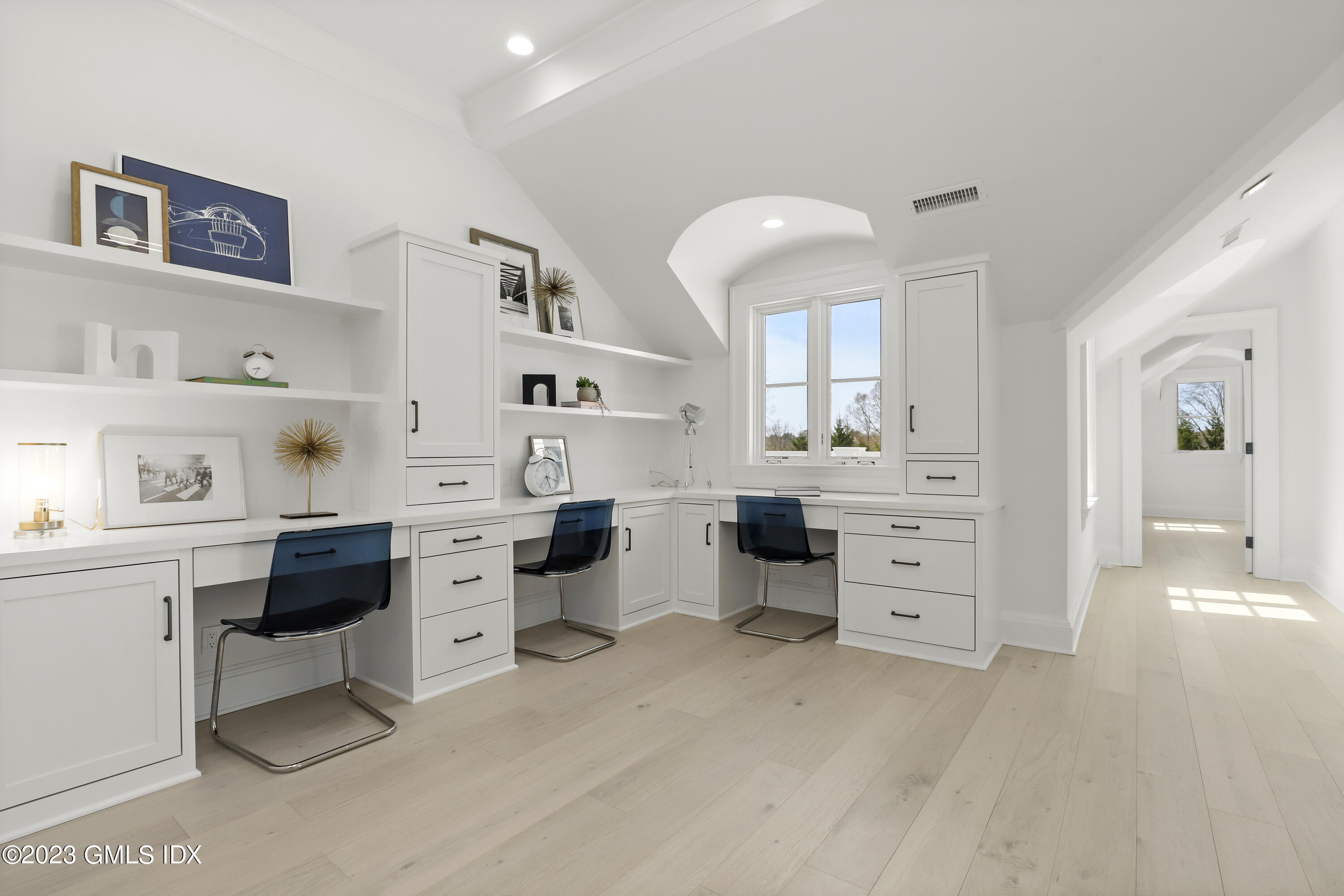 32 Meadowcroft Lane Greenwich, CT 06830 - Photo 20 of 43 a kitchen with white cabinets and appliances