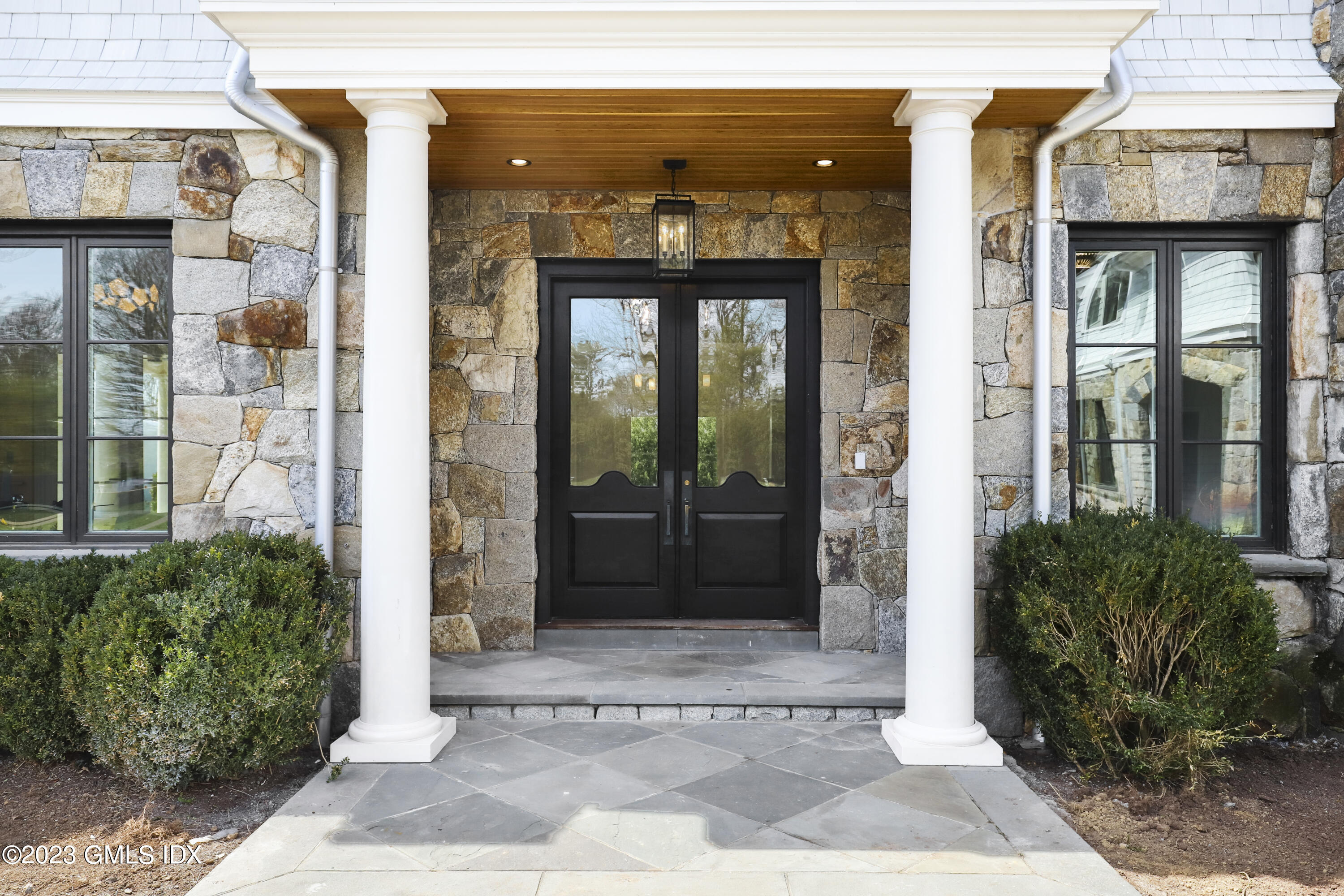 32 Meadowcroft Lane Greenwich, CT 06830 - Photo 2 of 43 a view of entrance front of the building