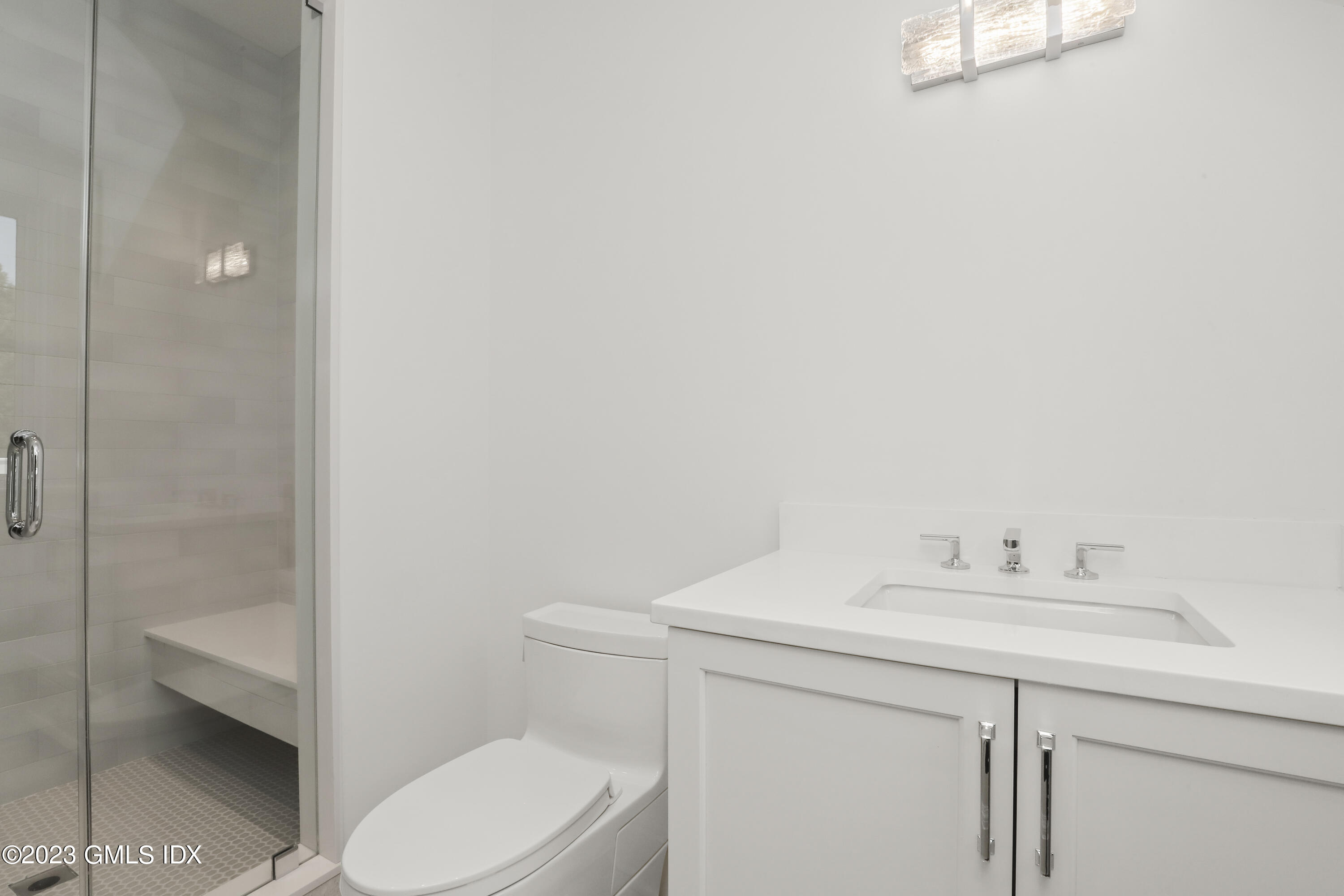 32 Meadowcroft Lane Greenwich, CT 06830 - Photo 26 of 43 a bathroom with a sink toilet and shower