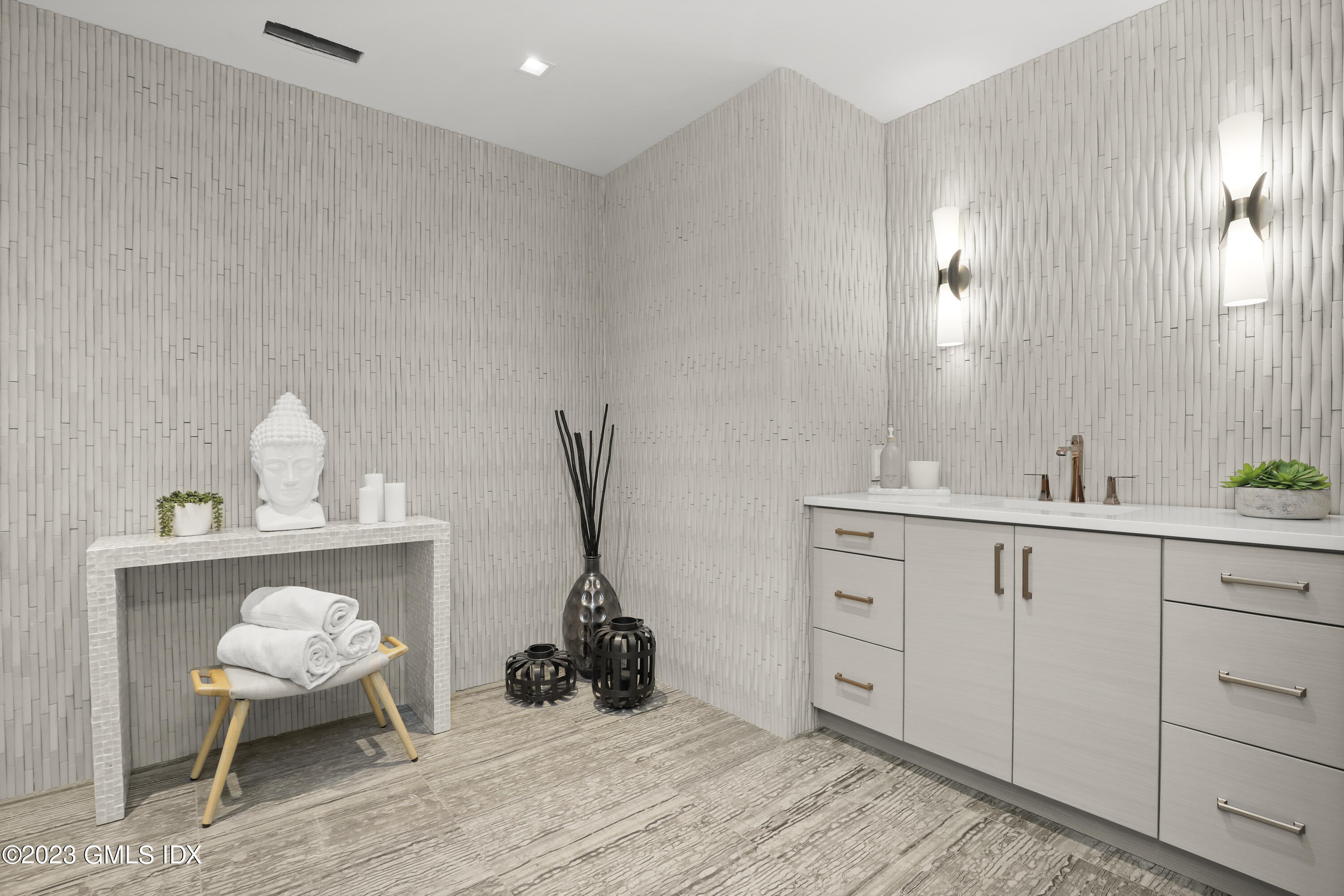 32 Meadowcroft Lane Greenwich, CT 06830 - Photo 35 of 43 a spacious bathroom with a double vanity sink and a mirror