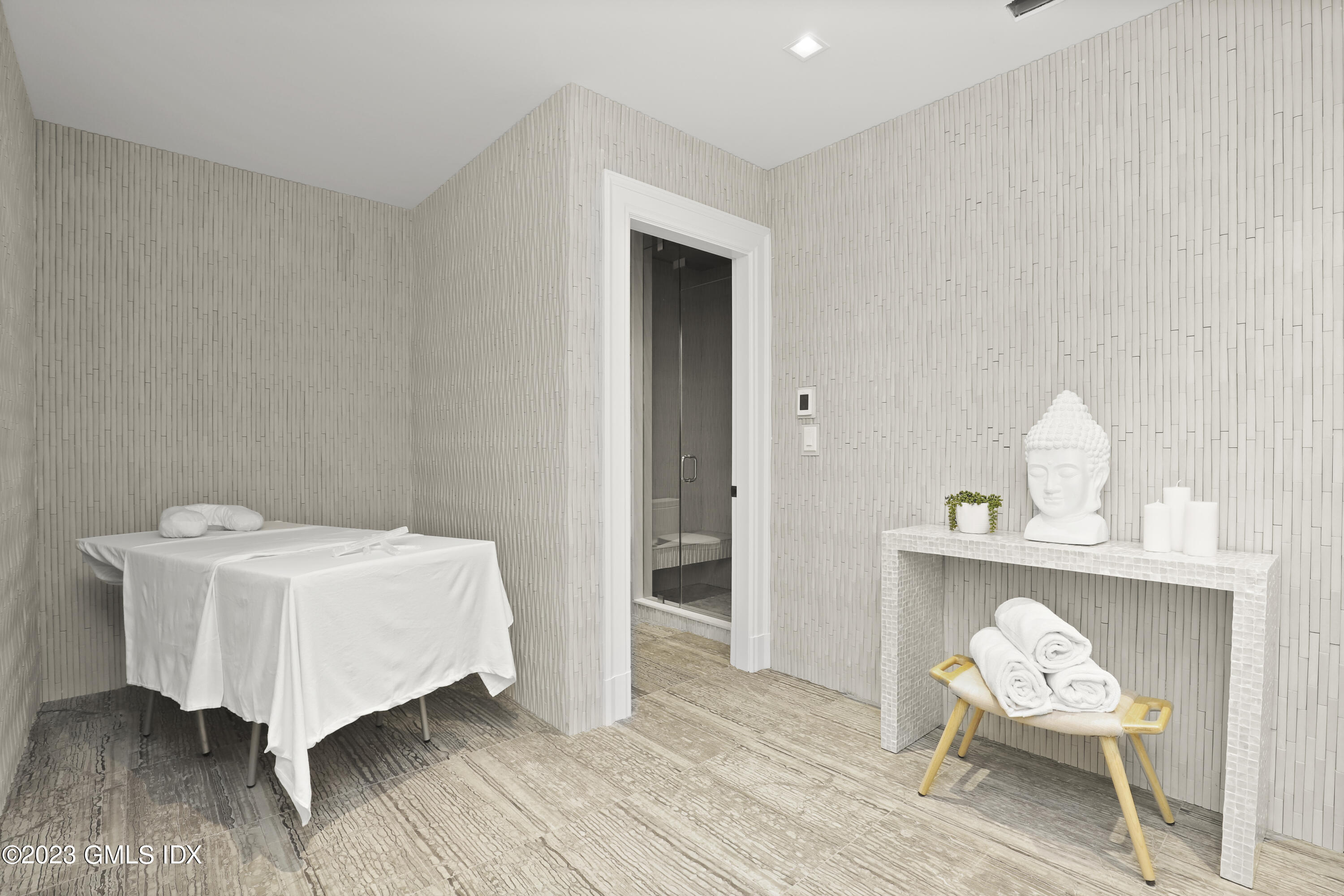 32 Meadowcroft Lane Greenwich, CT 06830 - Photo 36 of 43 a room with a table chair and wooden floor