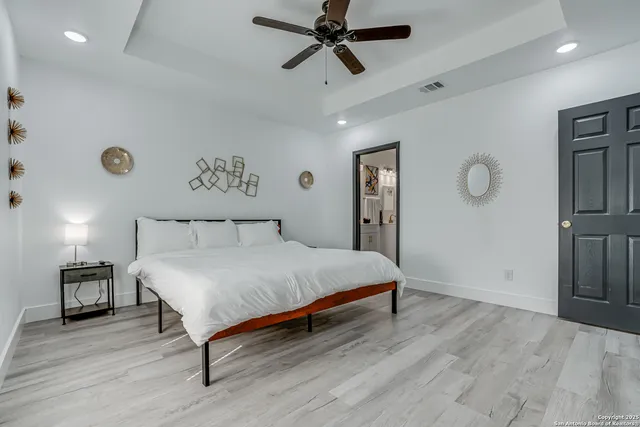 a bathroom with a sink and mirror