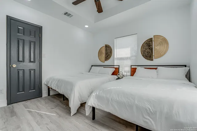 a view of a swimming pool with a yard