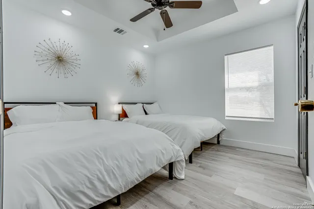 a view of a swimming pool with a patio