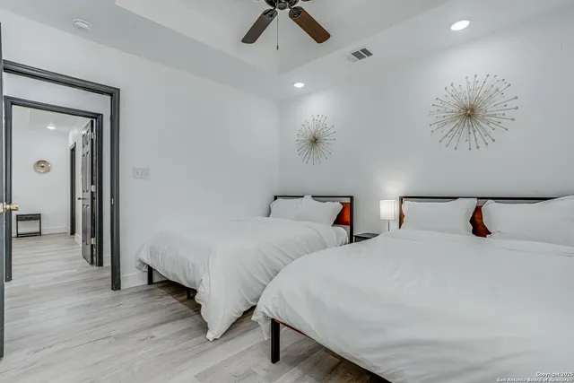 an aerial view of residential building and parking space