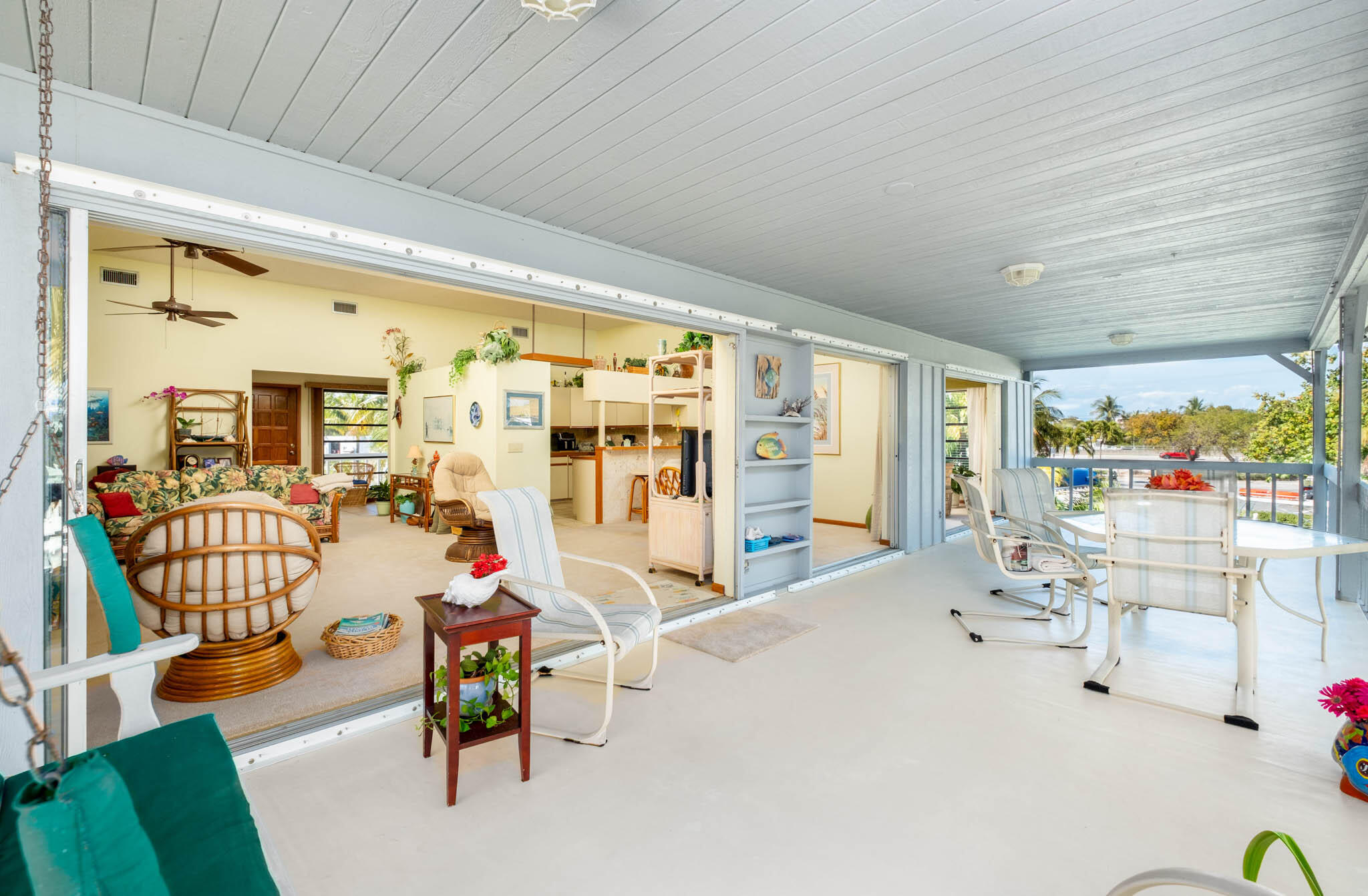 216 Sonny Road Tavernier, FL 33070 - Photo 18 of 49 a bedroom with furniture and a large window