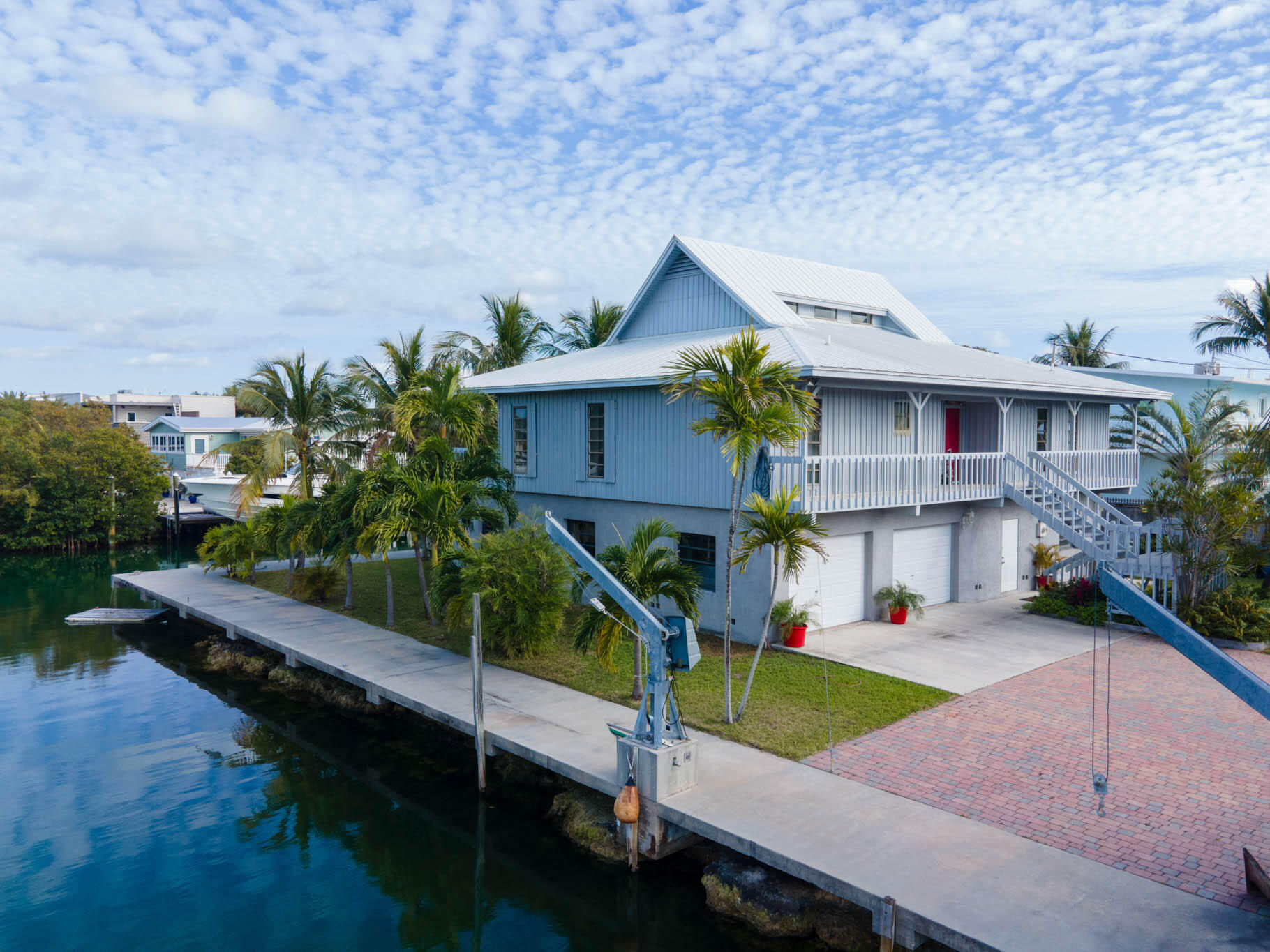 216 Sonny Road Tavernier, FL 33070 - Photo 36 of 49 a front view of house with yard and green space