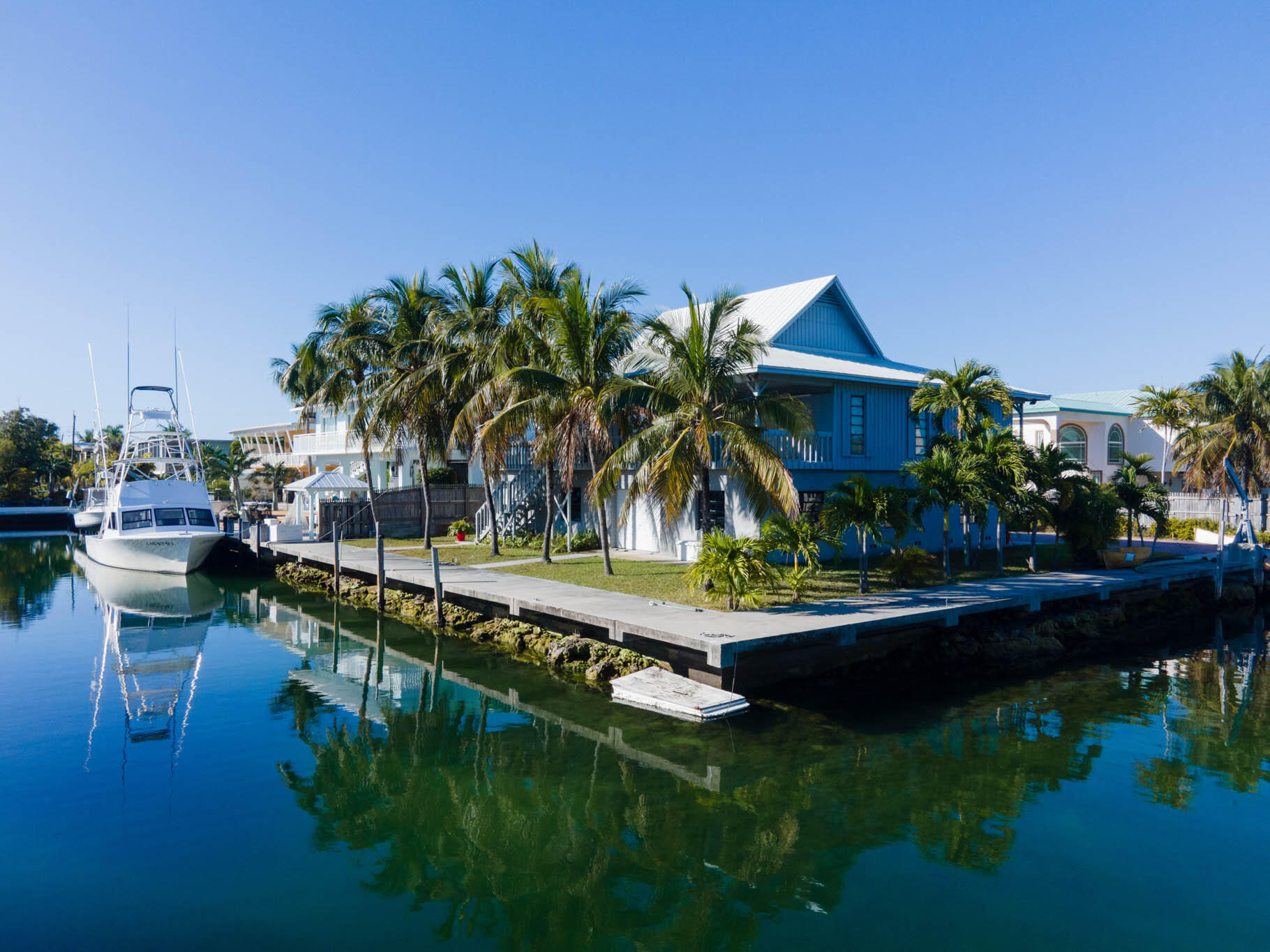 216 Sonny Road Tavernier, FL 33070 - Photo 38 of 49 a front view of a house with garden