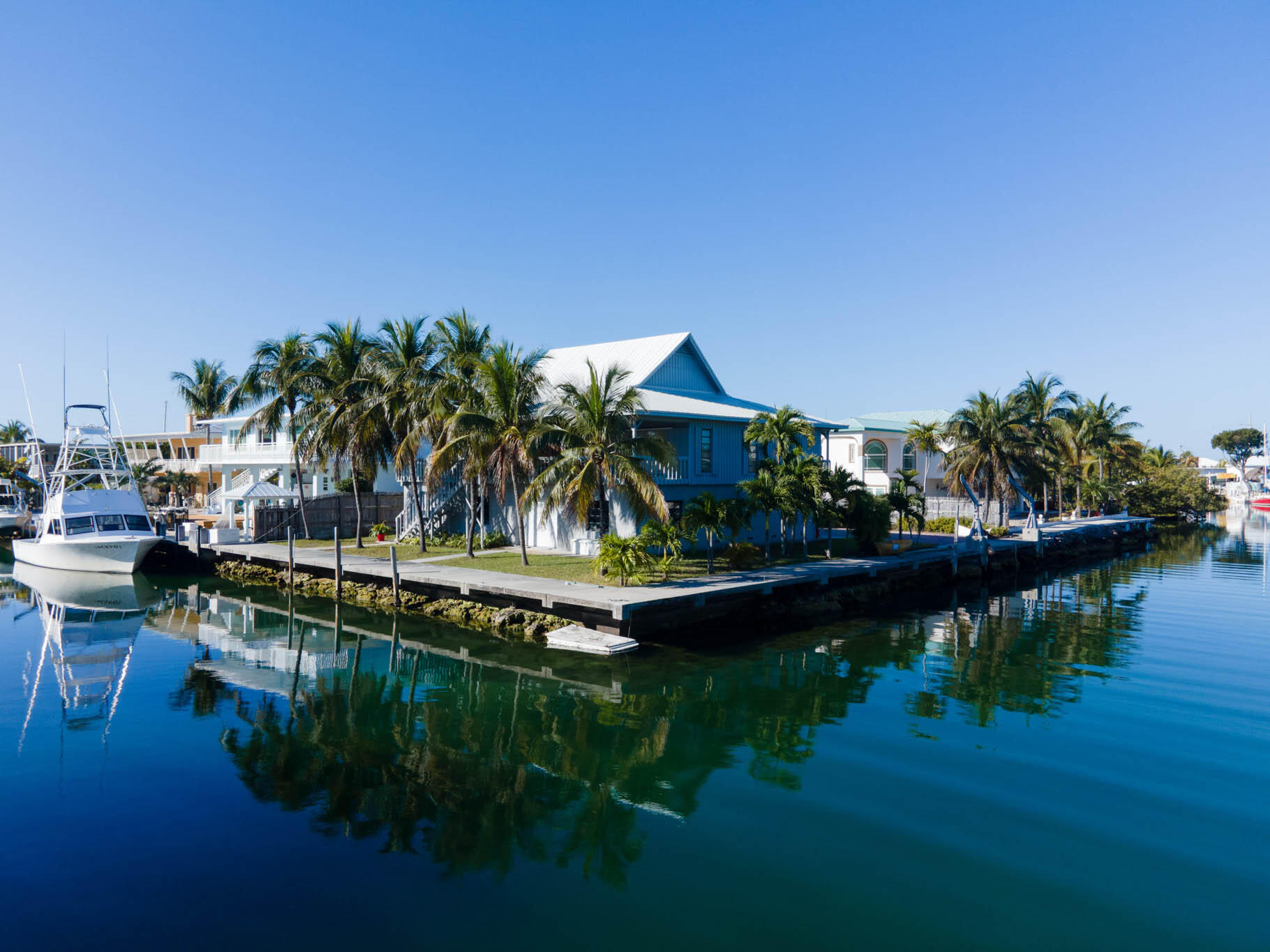 216 Sonny Road Tavernier, FL 33070 - Photo 39 of 49 a view of swimming pool with outdoor seating and lake view