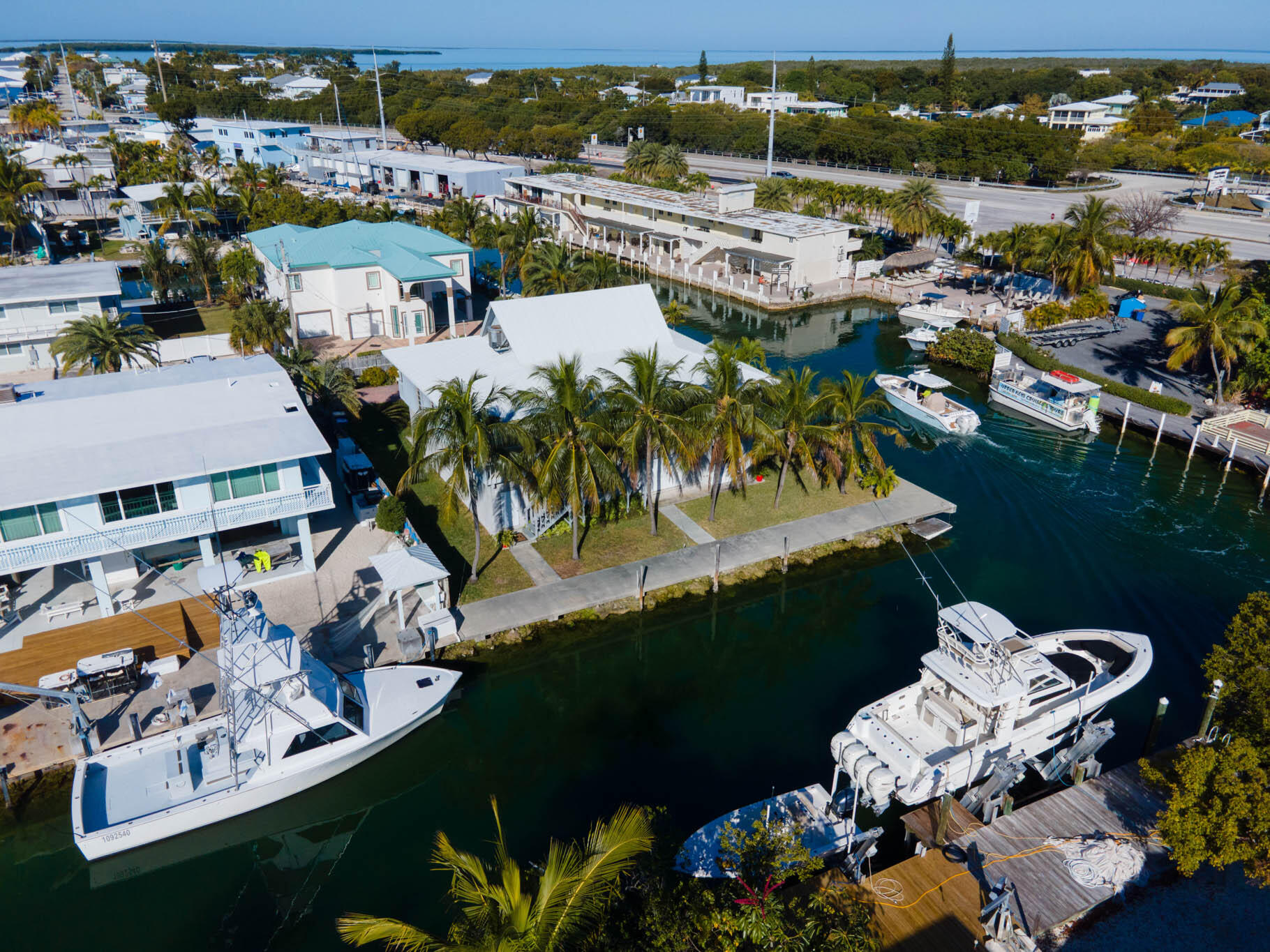 216 Sonny Road Tavernier, FL 33070 - Photo 43 of 49 an aerial view of a house with yard swimming pool and outdoor seating