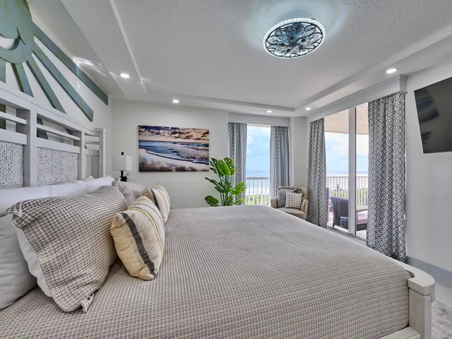 a view of a garden with a building in the background