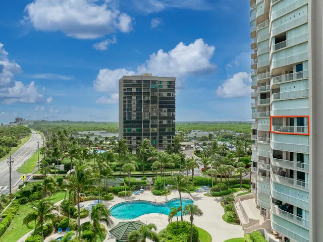 a view of an empty room with glass door