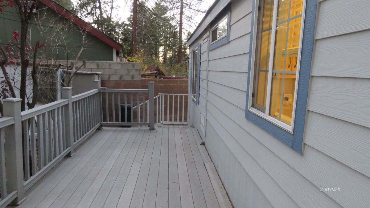 52901 Pine Cove Road, Unit 2 Idyllwild, CA 92549 - Photo 10 of 13 a view of a balcony with wooden floor