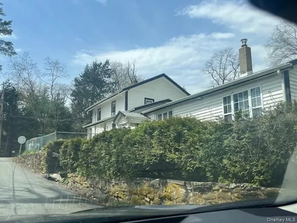 a house view with a garden space