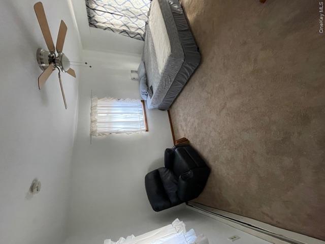 33 Eden Road, Unit 41 Cuddebackville, NY 12729 - Photo 17 of 34 a spacious bedroom with a bed and window