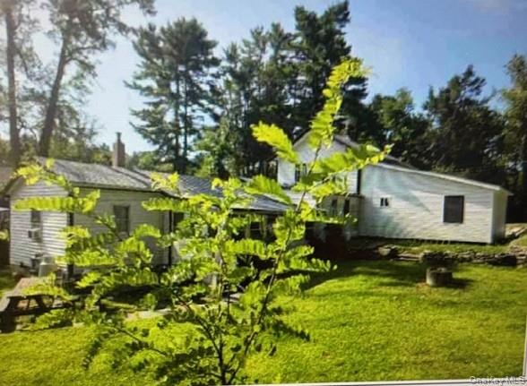 33 Eden Road, Unit 41 Cuddebackville, NY 12729 - Photo 33 of 34 a backyard of a house with lots of green space