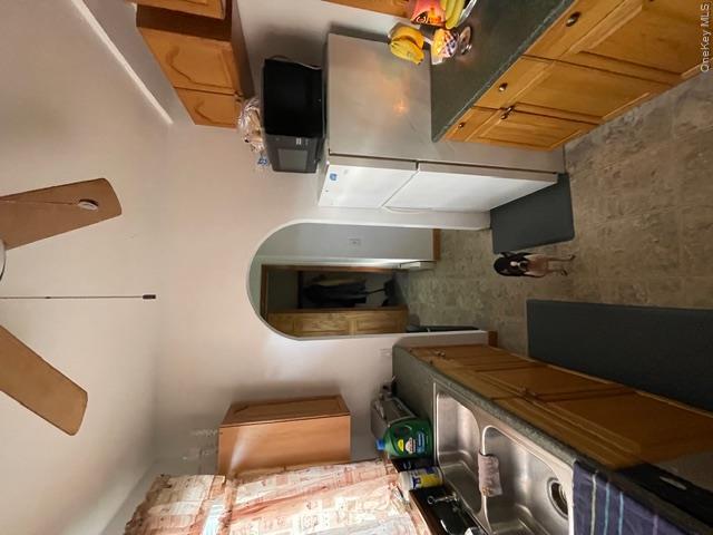 33 Eden Road, Unit 41 Cuddebackville, NY 12729 - Photo 10 of 34 a kitchen with sink refrigerator and stove