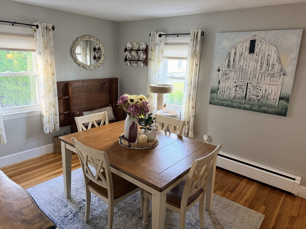 26 Colonial Road Peabody, MA 01960 - Photo 12 of 25 a view of a dining room with furniture and wooden floor