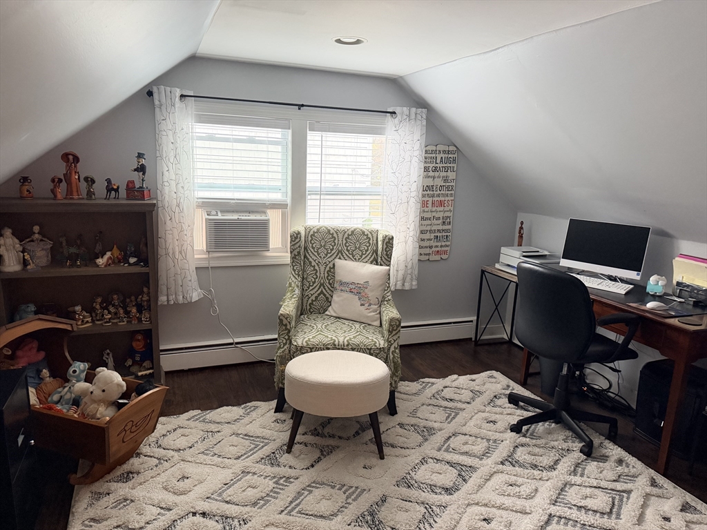 26 Colonial Road Peabody, MA 01960 - Photo 13 of 25 a view of a workspace with furniture and a window